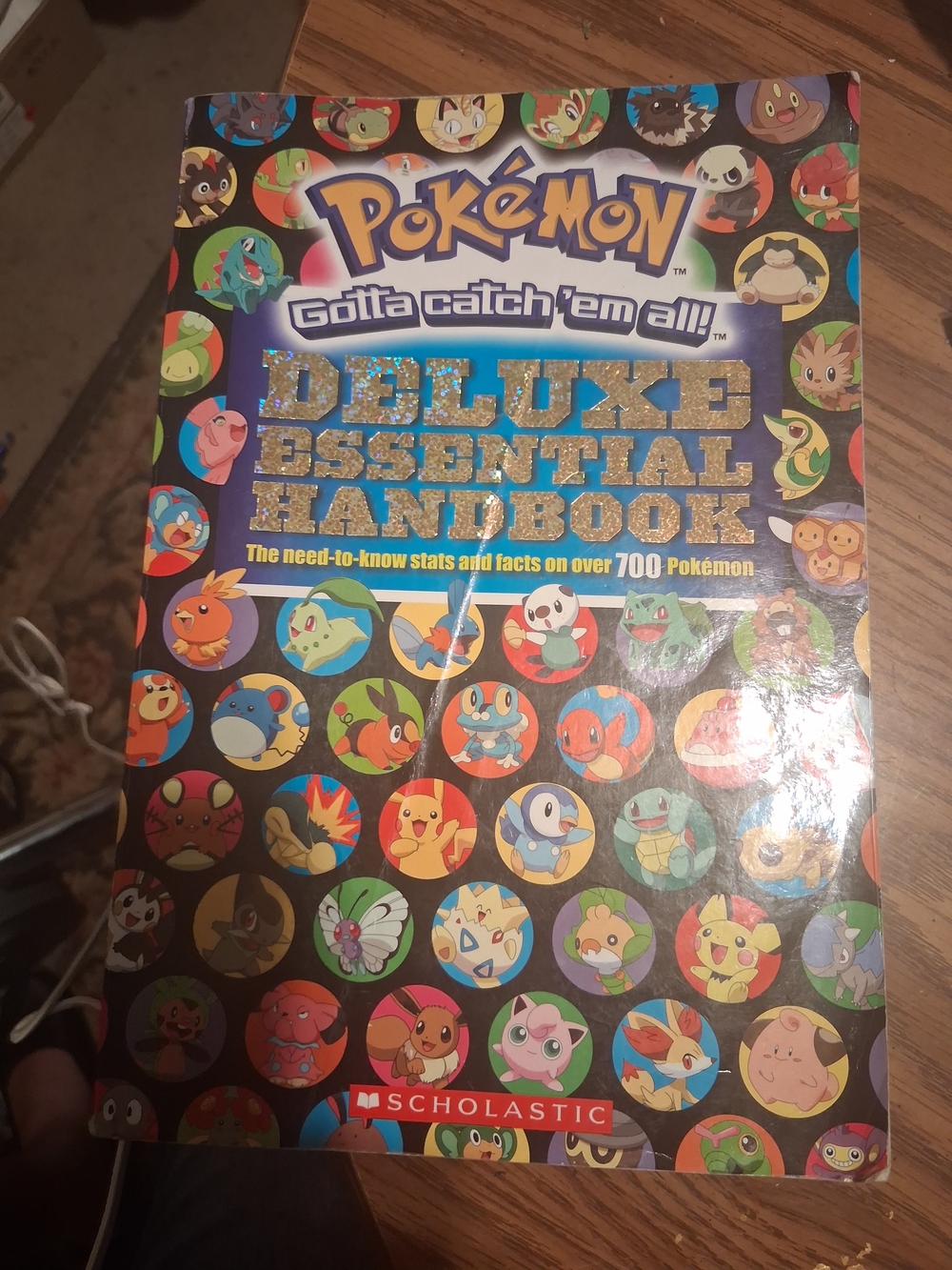 Book Cover - Pokémon Deluxe Essential Handbook